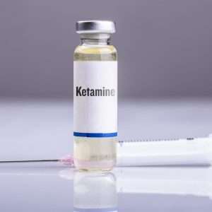 Ketamine & Syringe, blair background. Buy Ketamine Online at Psyttraxx.
